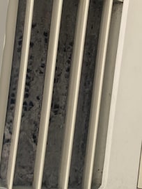 Ac vent filled w dust and debris