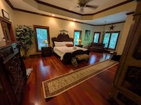 Main master suite contains two full bathrooms and two full walk-in closets