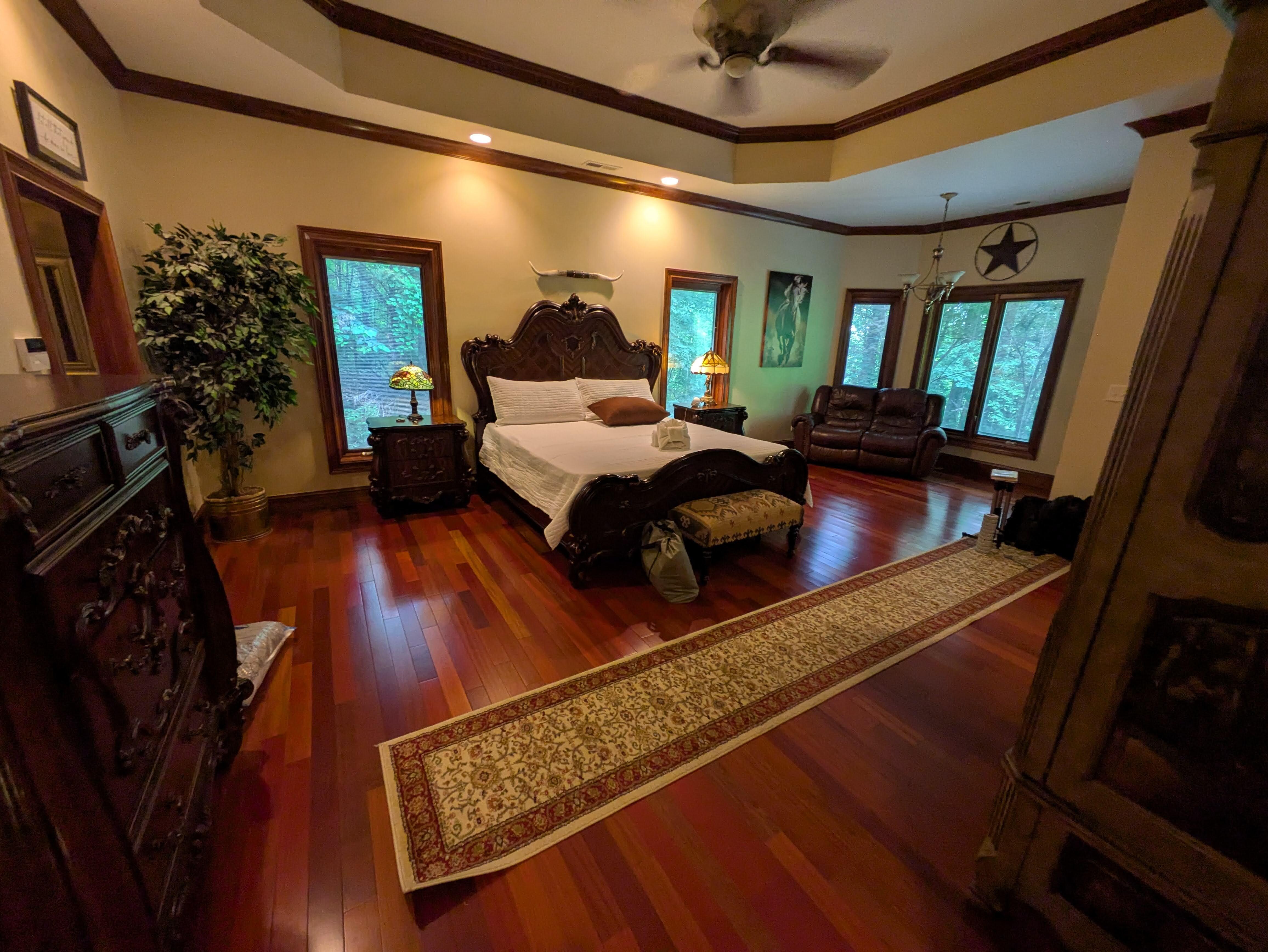 Main master suite contains two full bathrooms and two full walk-in closets