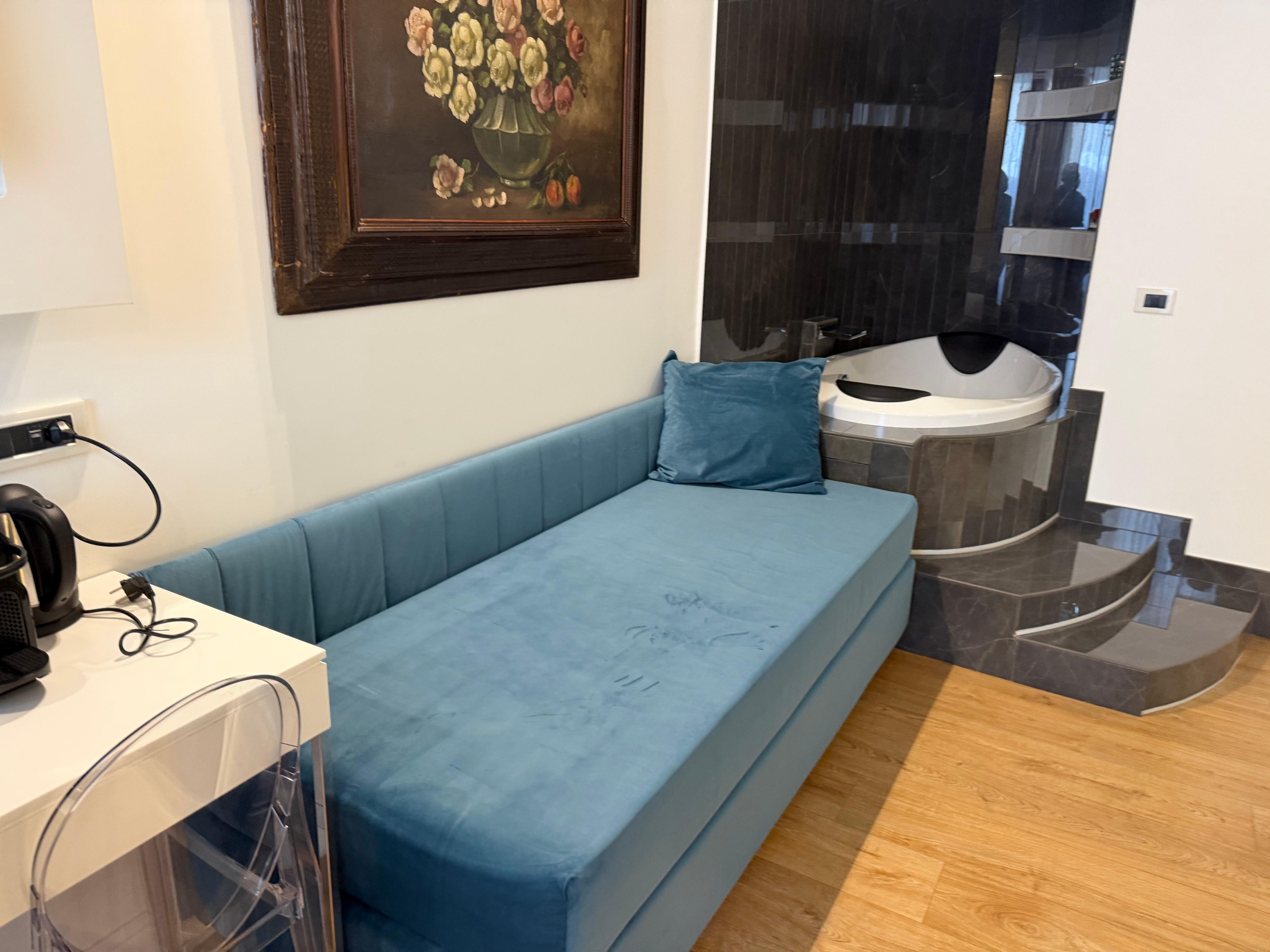 Desk, sofa/loveseat and hot tub