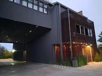 Sleek exterior with visually private courtyard