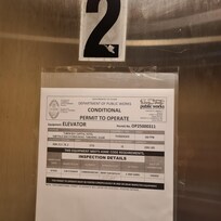posted sign for elevator under repair