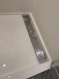 Drain clogged/flooding.