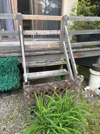Collapse-ready back porch attached to dining room with lights that don't work.