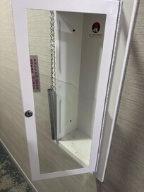 Broken glass and missing extinguisher