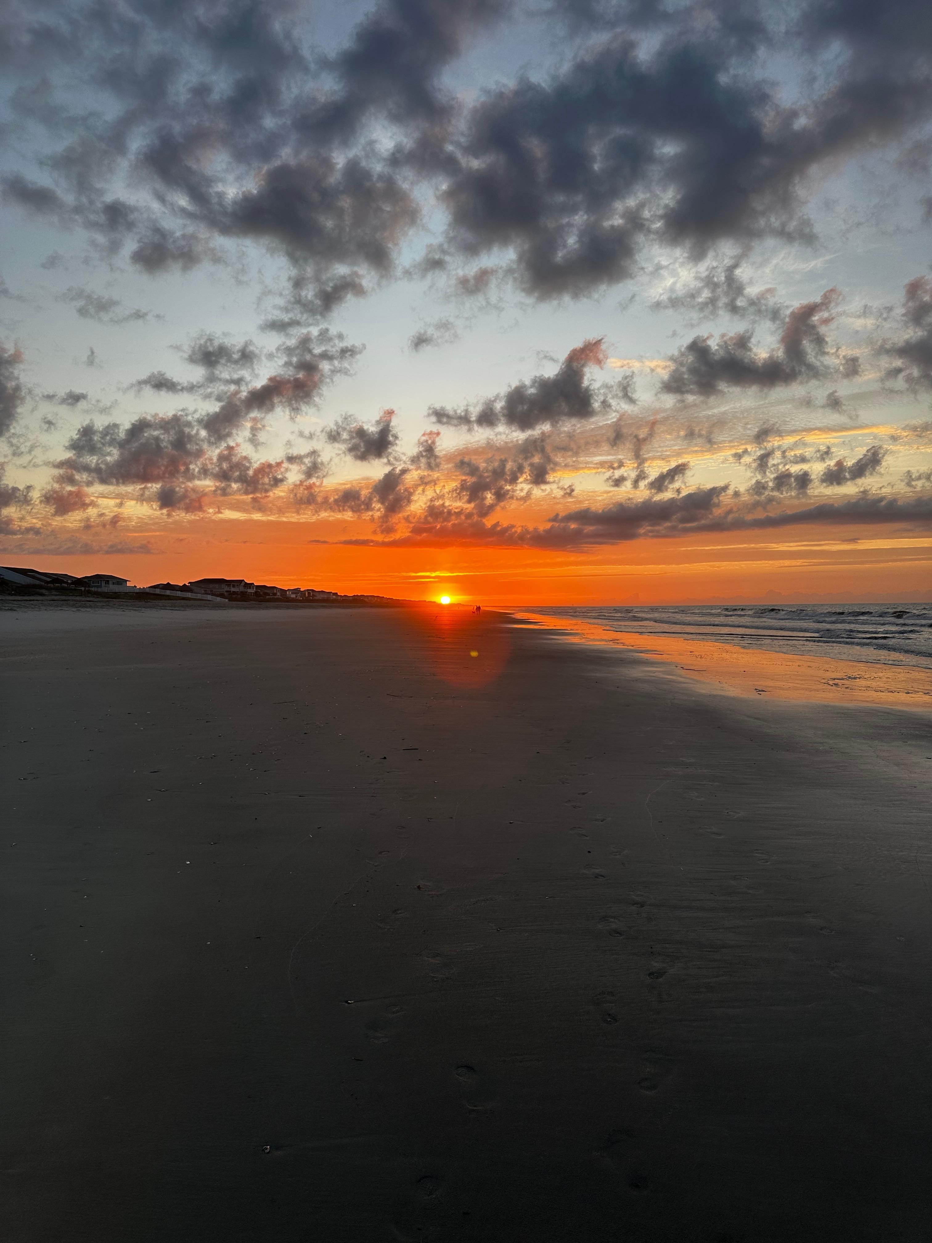 Sunrise from beach in front of the unit