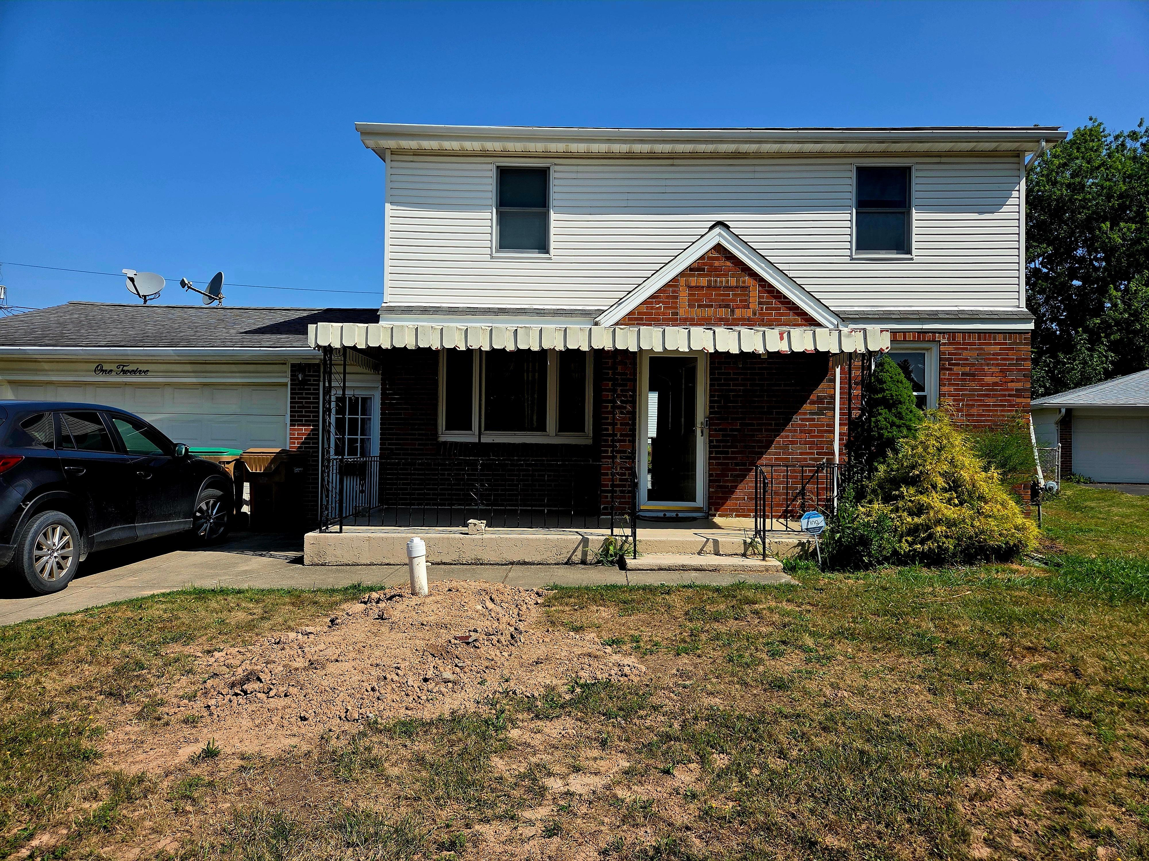 Town construction for new sewer lines in the front yard, that was not disclosed.