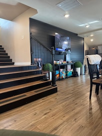 Big living area!-- when you walk into! The kids said the landing to the stairs was a stage!