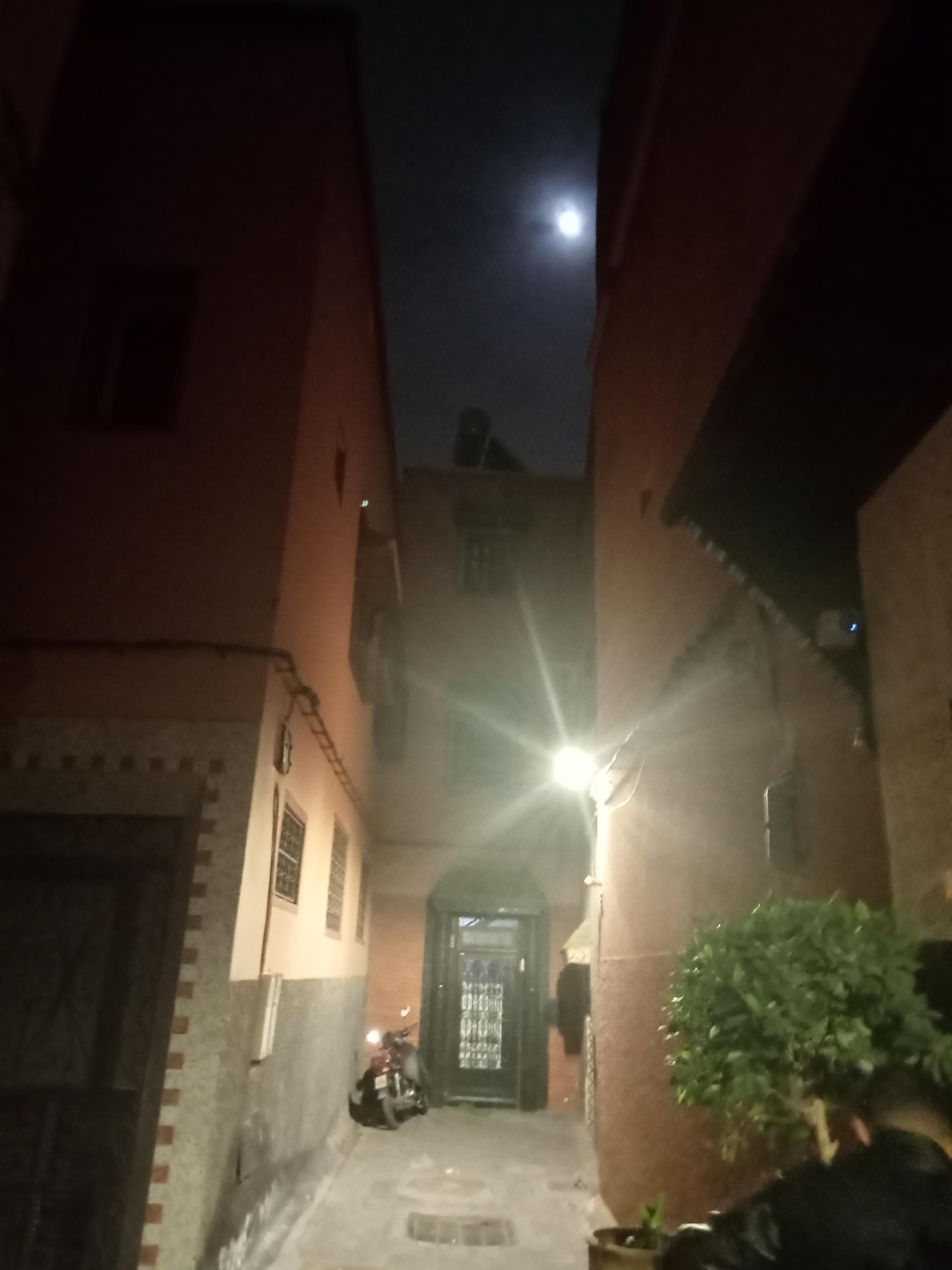 Arriving at the door after dark.