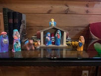 I brought a small nativity set. Each person on the trip painted a piece. This will certainly bring back memories of our wonderful trip, when we unpack it each Christmas.