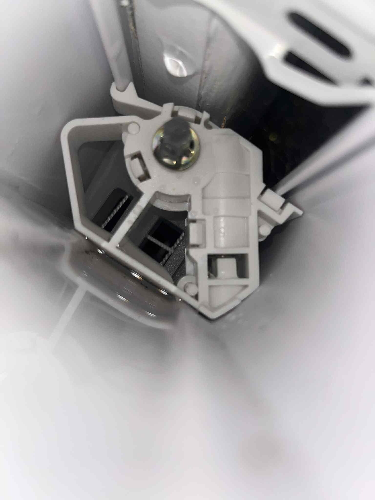 The water leaking through window and blinds during rain storm