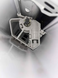 The water leaking through window and blinds during rain storm