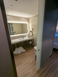 Non-private bathroom door.