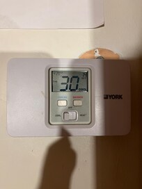 This is the wall thermostat was in Celsius. 30 degrees Celsius is about 86 degrees Fahrenheit.