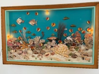 Fun, funky lighted 3D ocean wall art in the living room. Loved it!