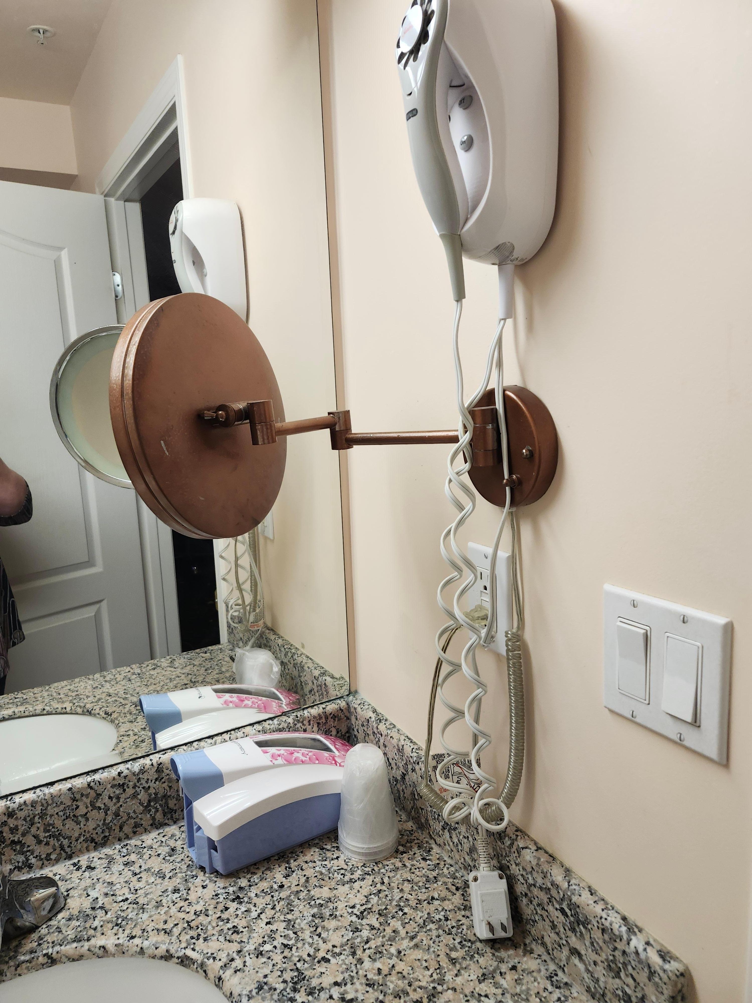 Soap dispenser on counter tops. Hair dryer doesn't work.