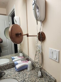 Soap dispenser on counter tops. Hair dryer doesn't work.