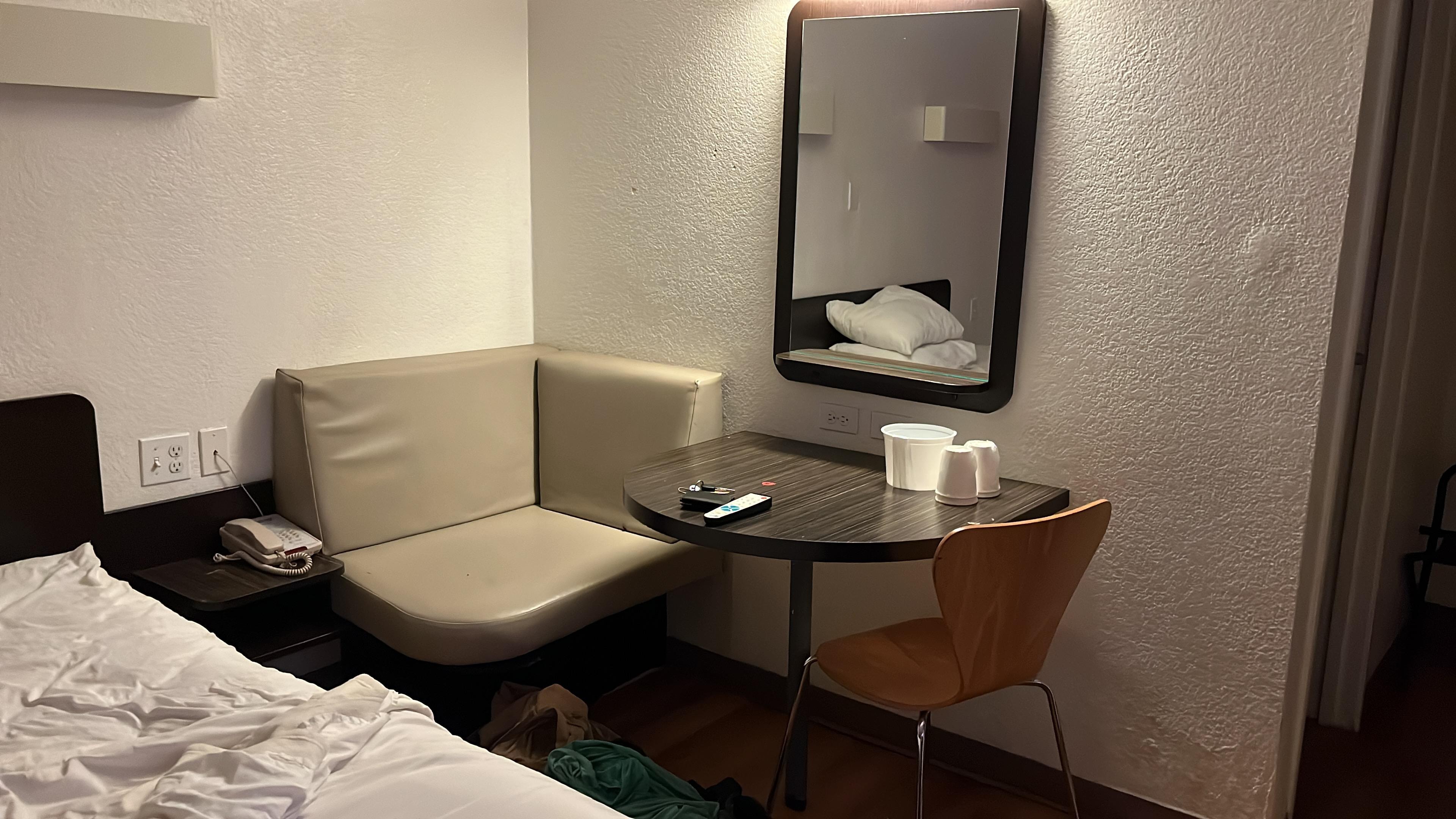 Cigarette burn on the booth looking thing