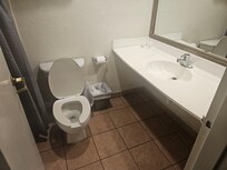 Drooping sink and water on ground