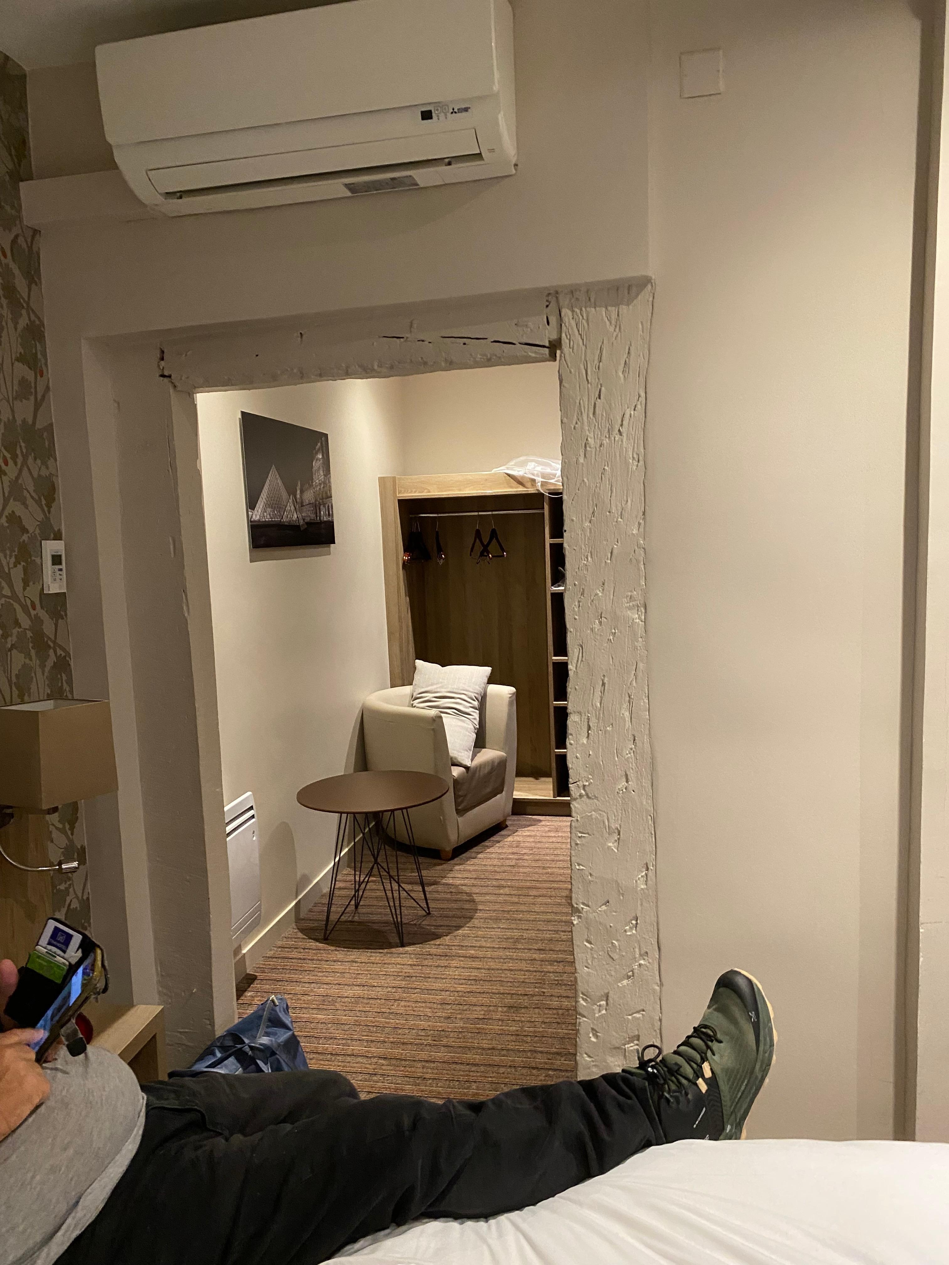 Beside the bed looking into the “dressing room” 