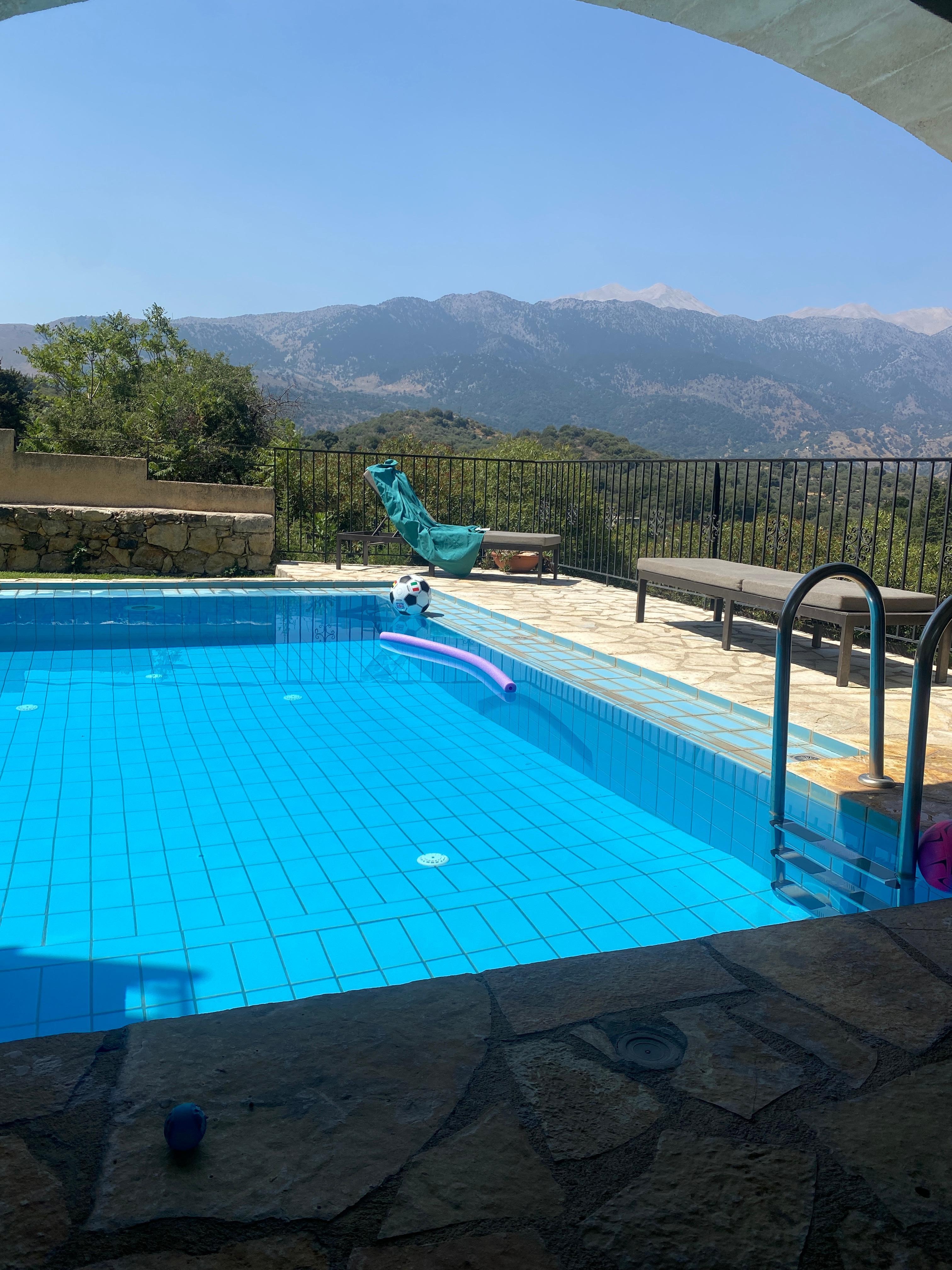 View from the pool over the mountains.
