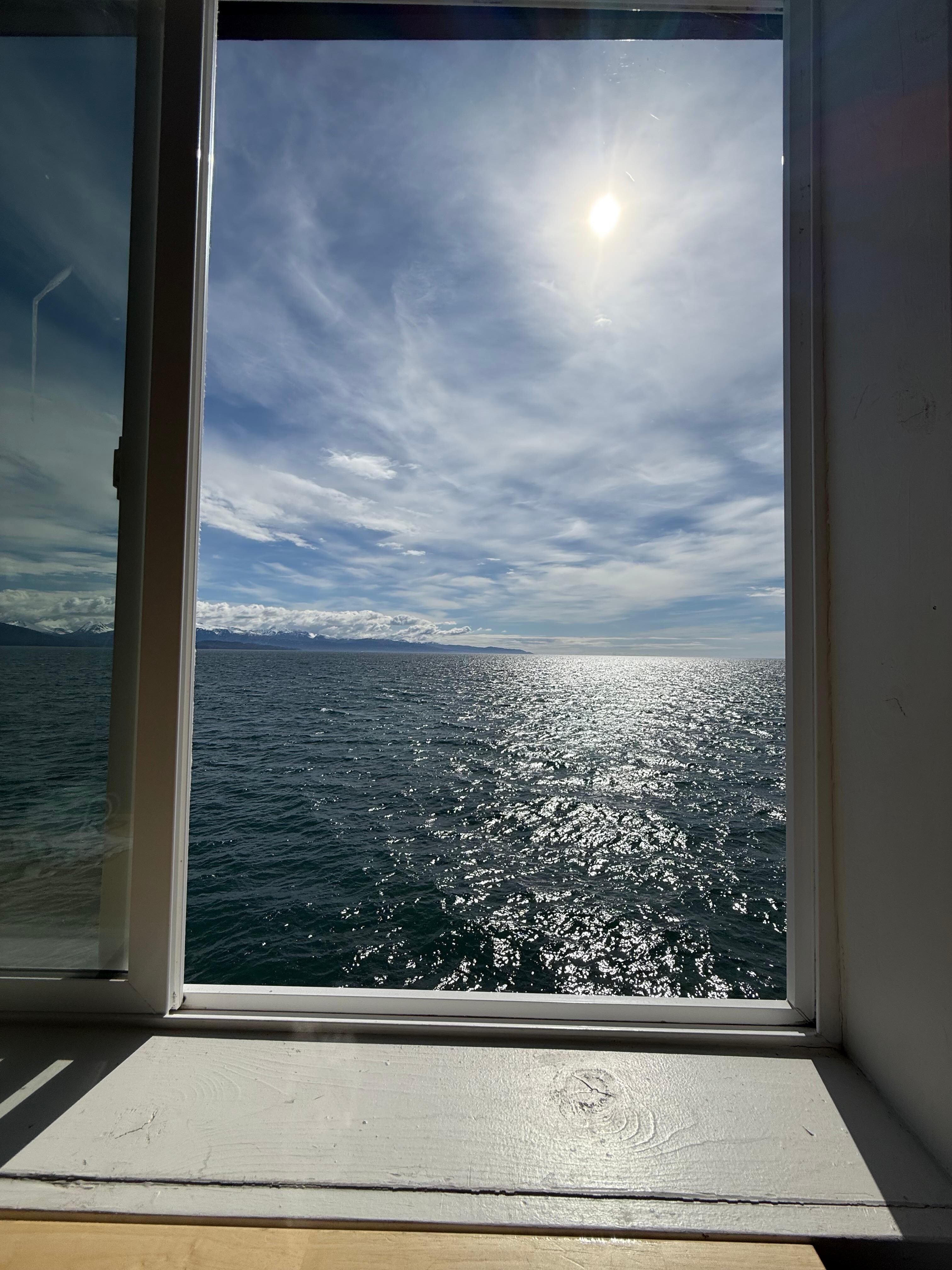 Looking out the window to the water.  