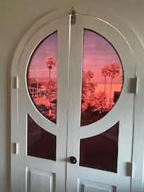 Looking out the balcony door of our room.