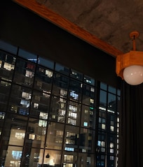 View of window in room from bed.