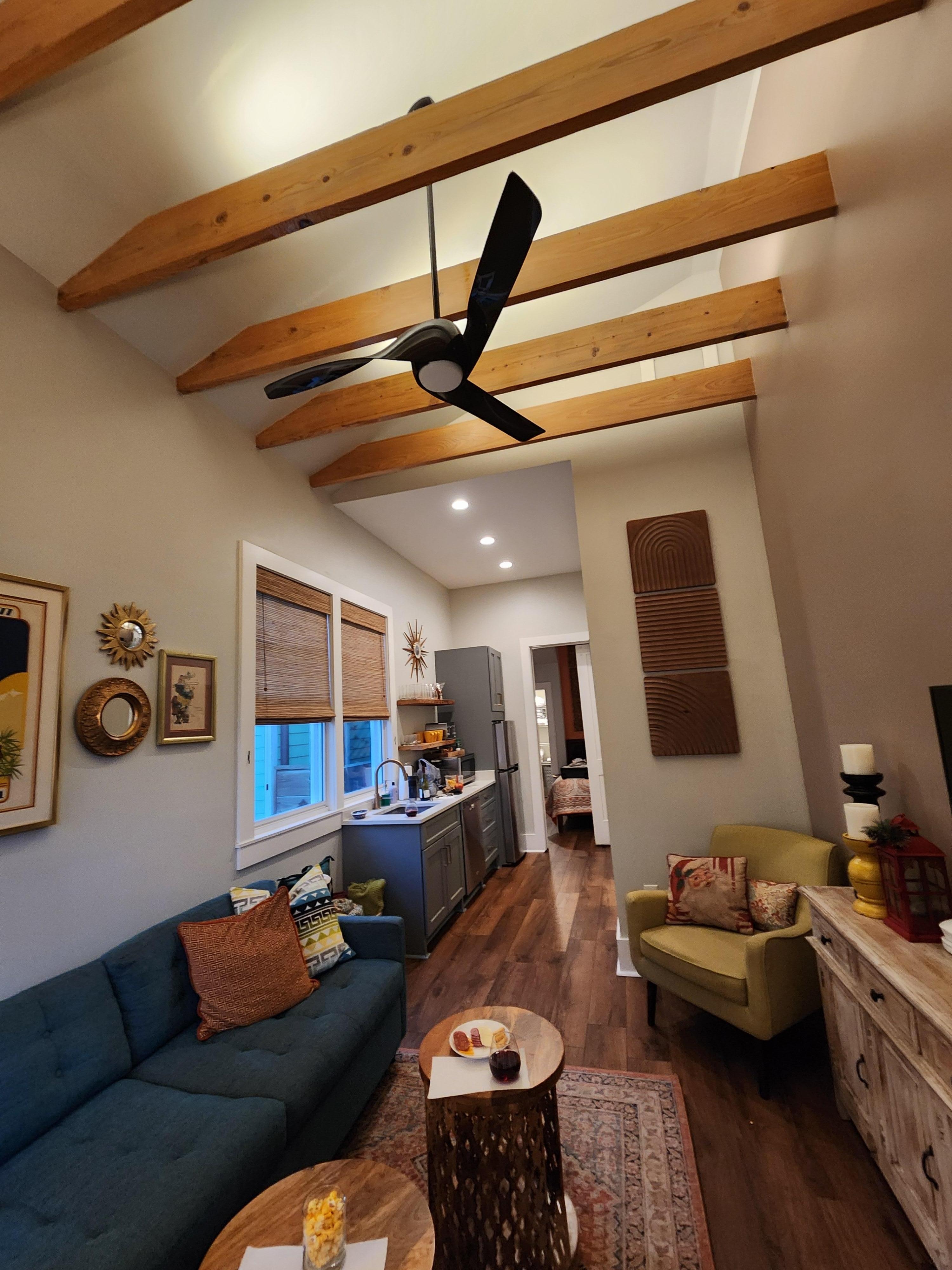 Living room looking towards kitchen and downstairs bedroom..