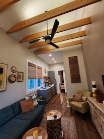 Living room looking towards kitchen and downstairs bedroom..