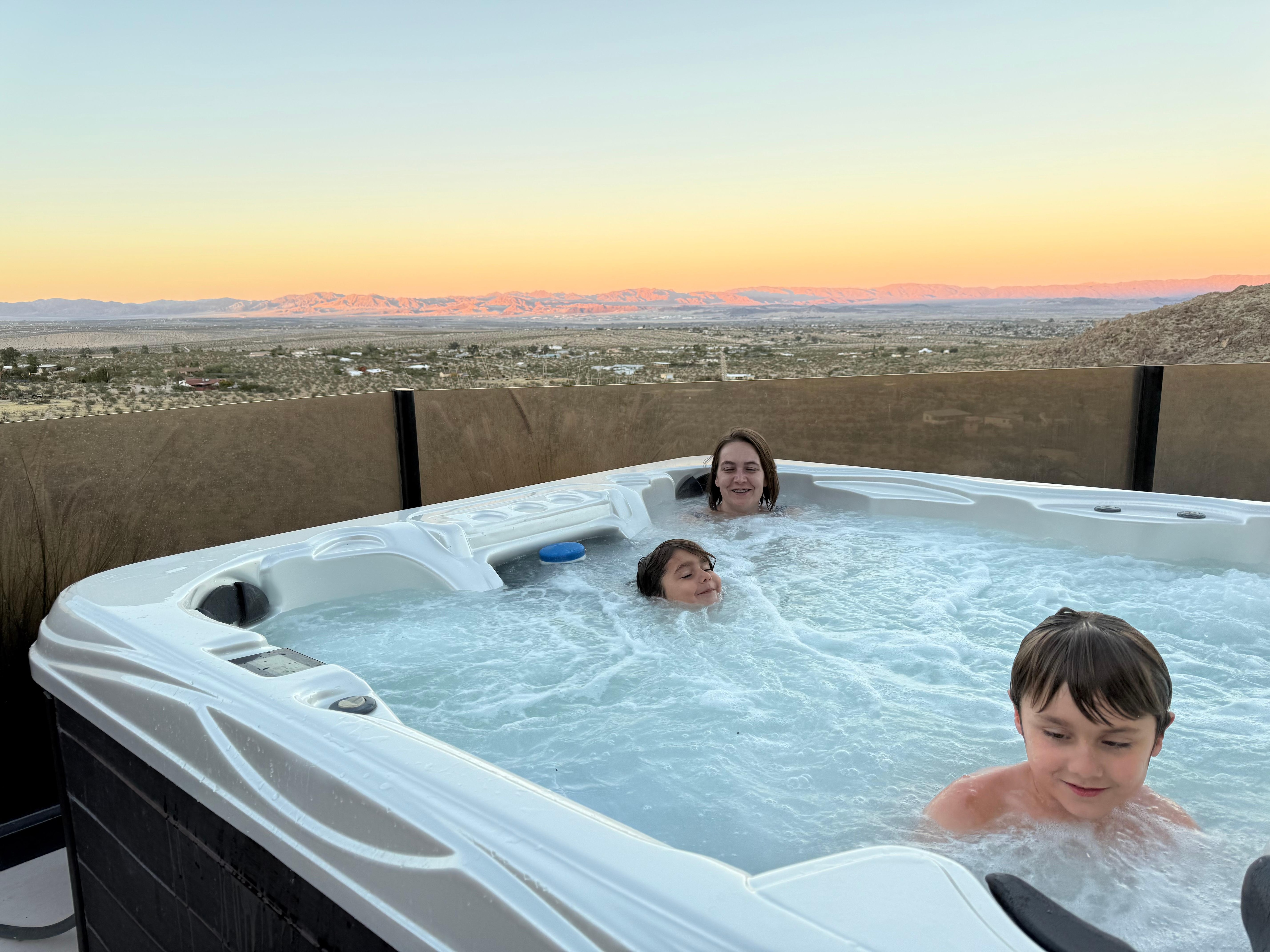 Enjoying the hot tub and view of the vista. 