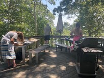 Shucking oysters and grilling