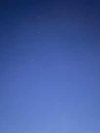 The Big Dipper n the evening sky while sitting by the campfire.