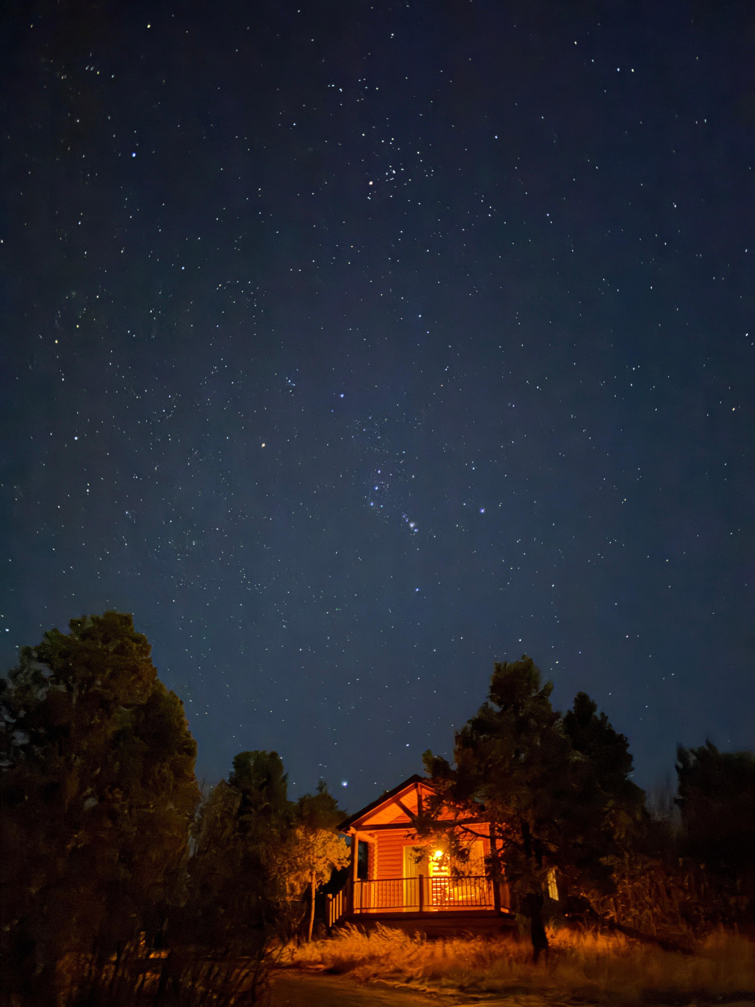 cabin under stars