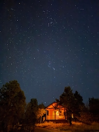 cabin under stars