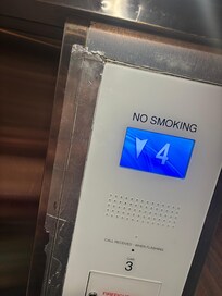 Elevator panels held together with duct tape