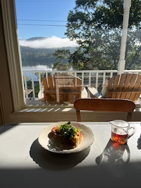 Breakfast watching the mist rise off the river.