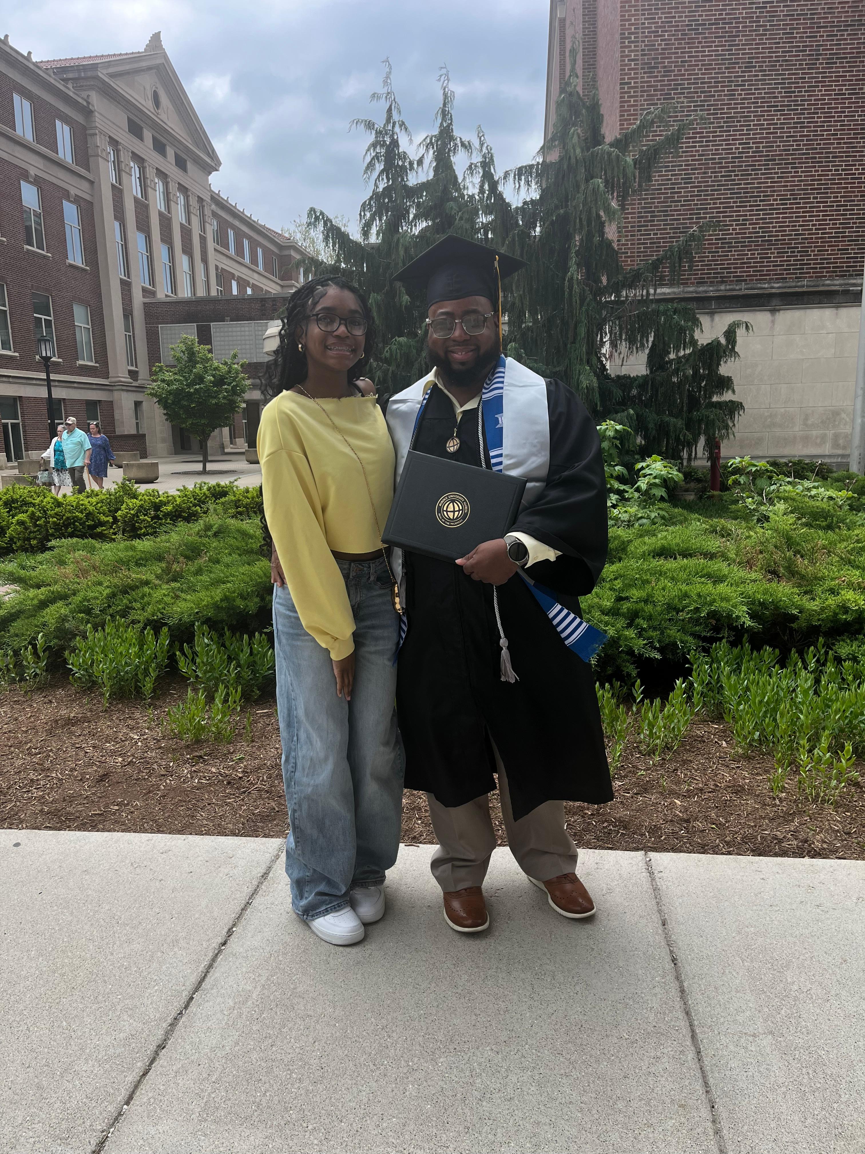 My 14 year old Cass H.S. granddaughter and her uncle the,  graduate.