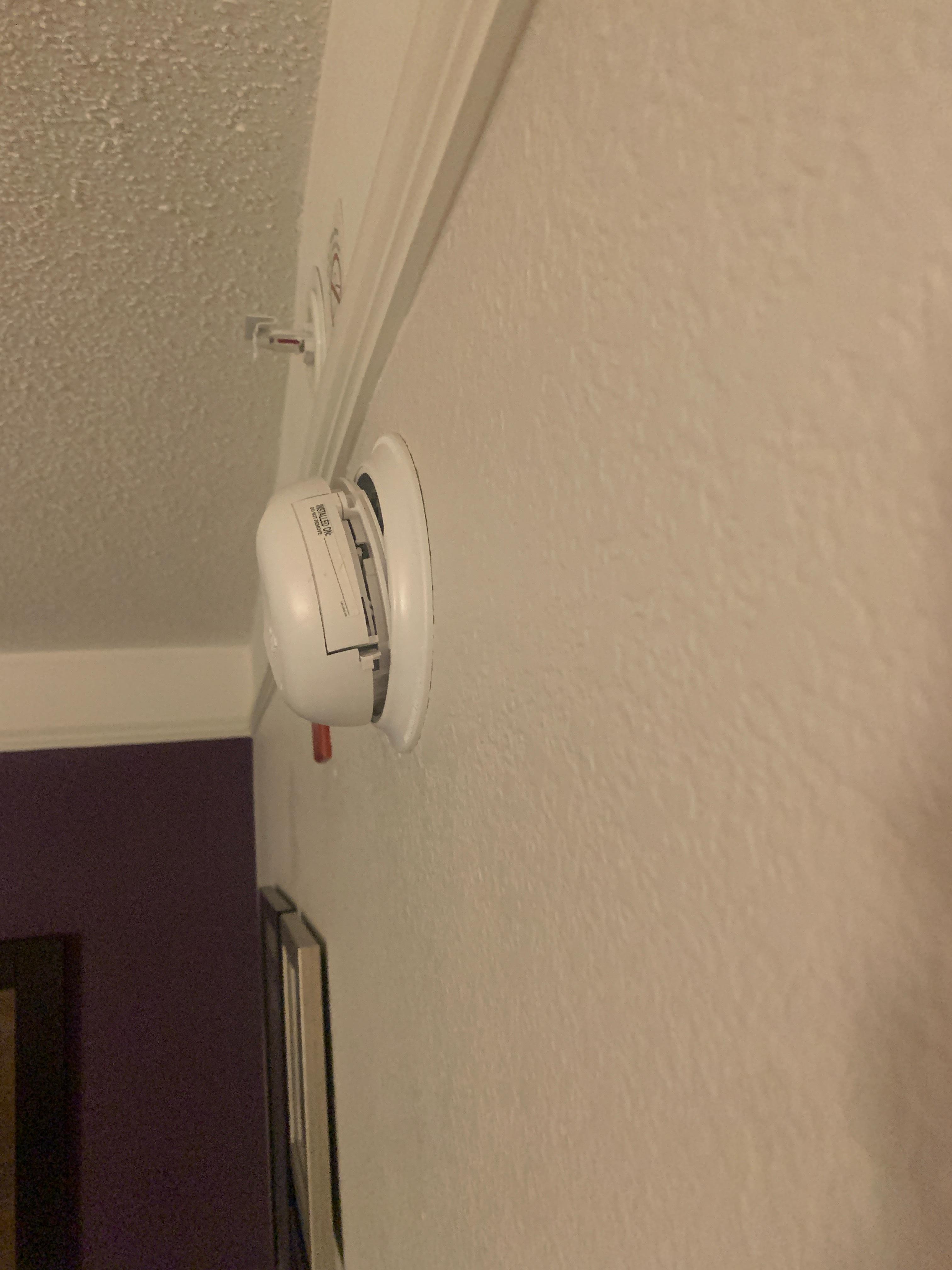 Alarm looked tampered with and was beeping nonstop (little things that add up)