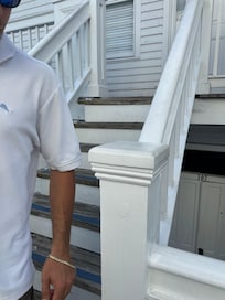 Flight of stairs right outside 115