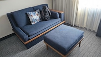 Sofa bed is large enough for 2 adults to fit comfortably.