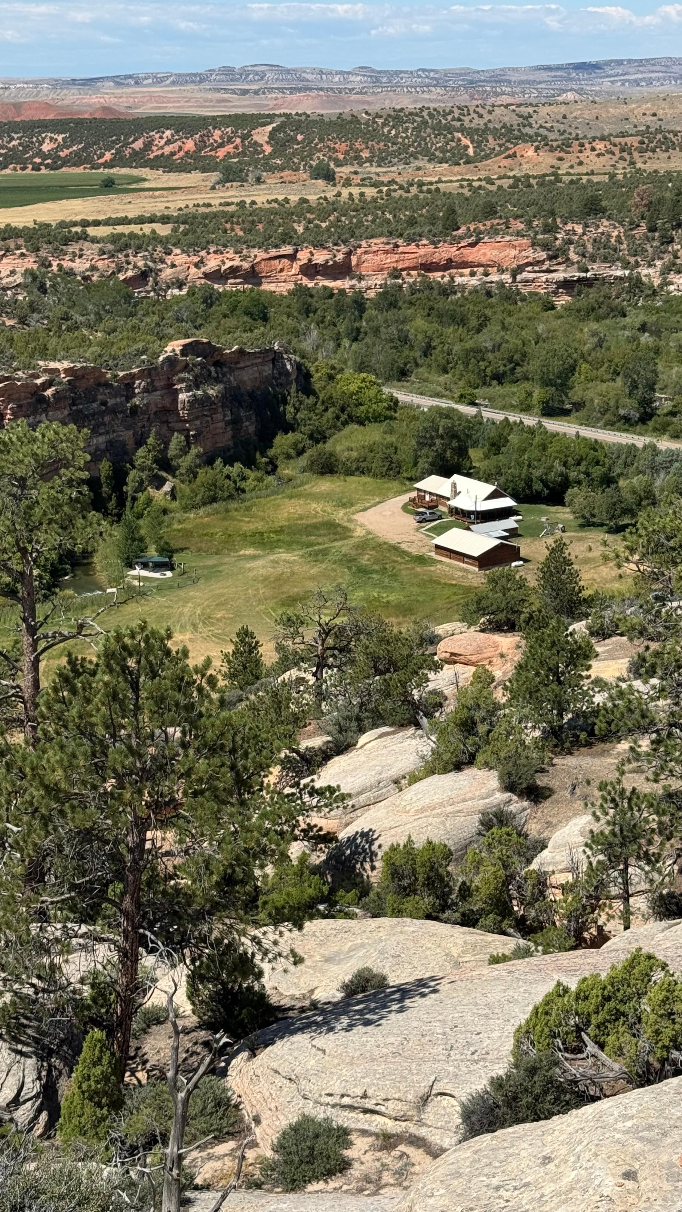 View of the house and cabana from the top of the east side of the canyon. 