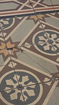Broken floor tiles
