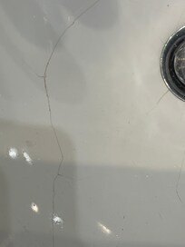 Cracks in two sinks (one sink shown)