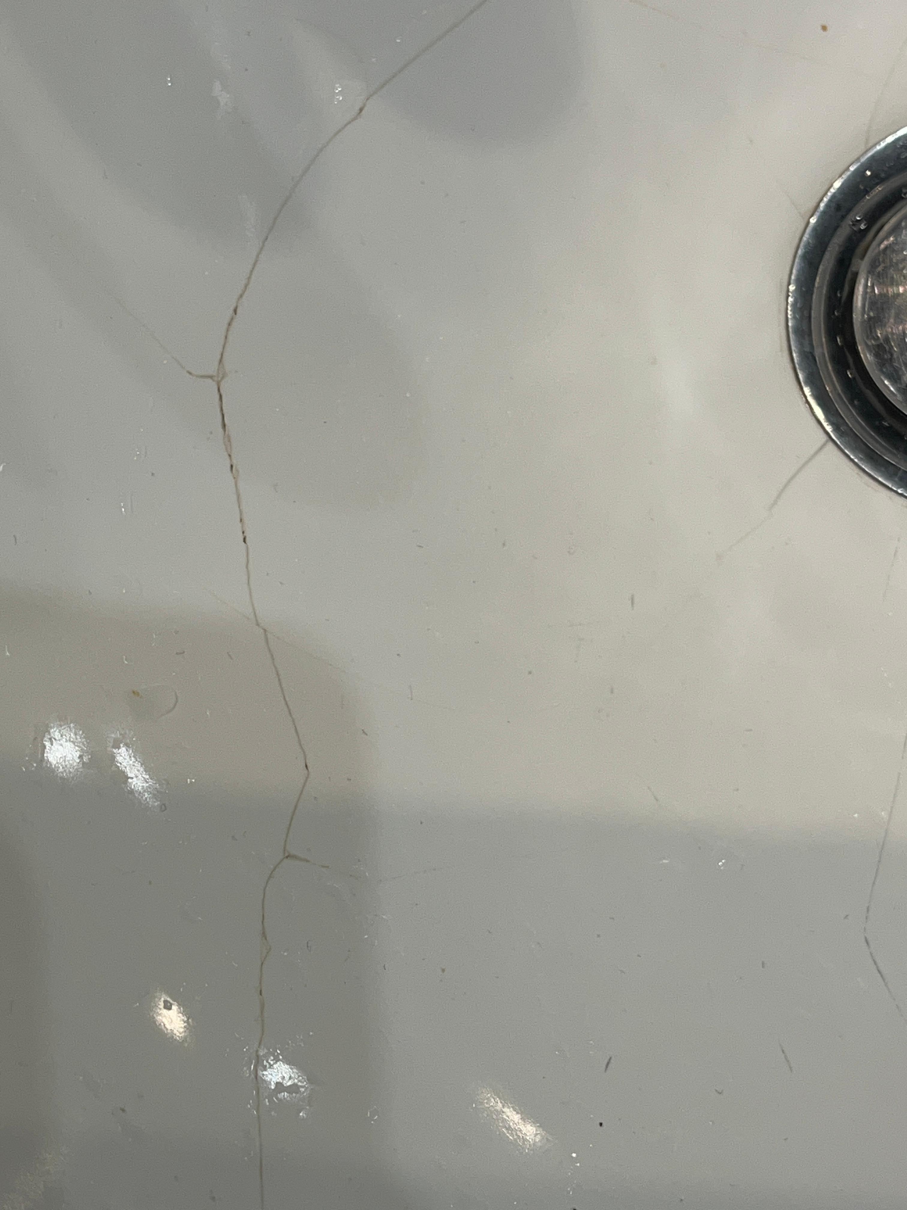 Cracks in two sinks (one sink shown)