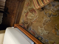 Huge stains on the carpet. This room was represented to be nice but clearly it is not.