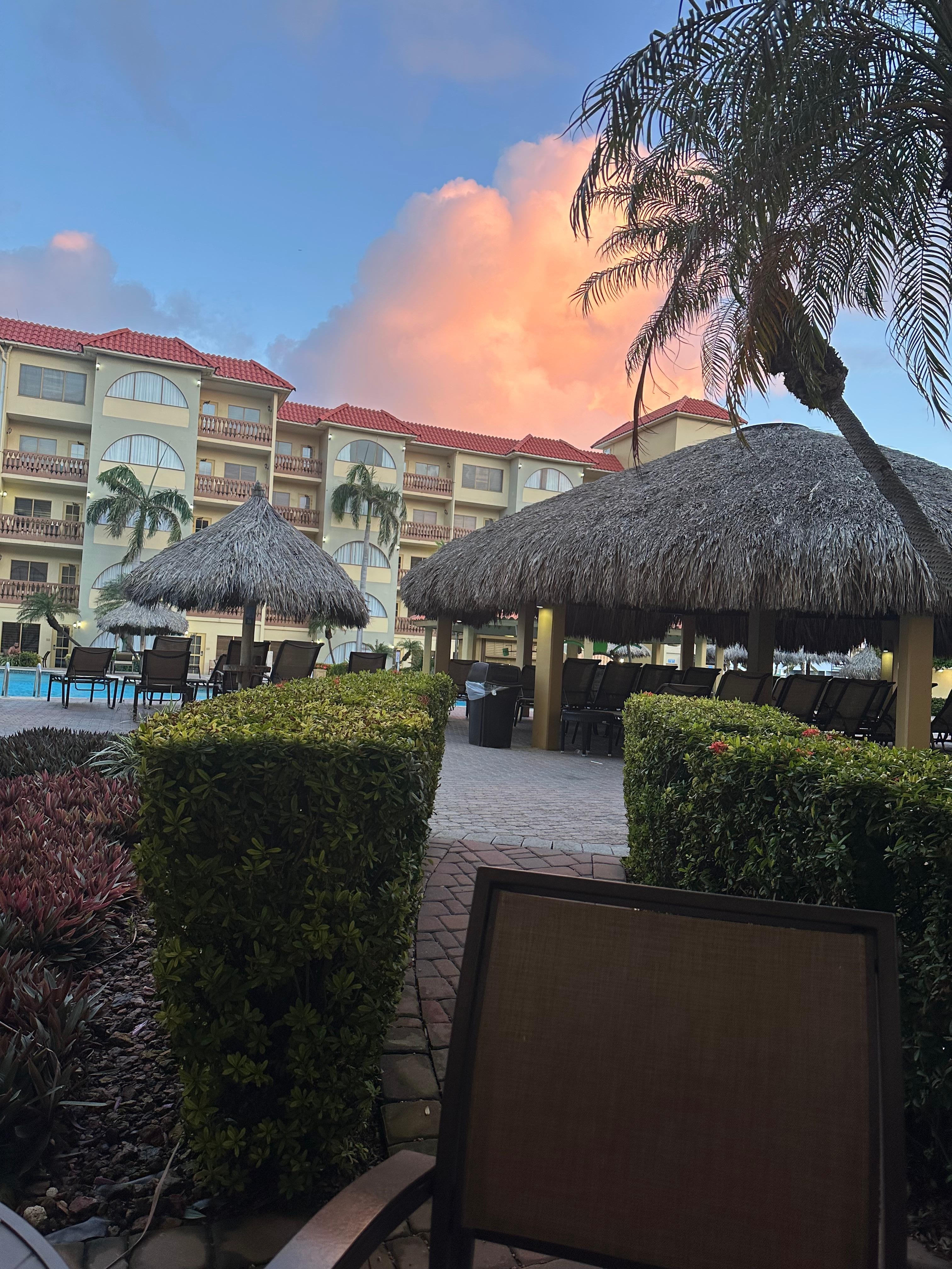 The room patio to the pool in the morning 