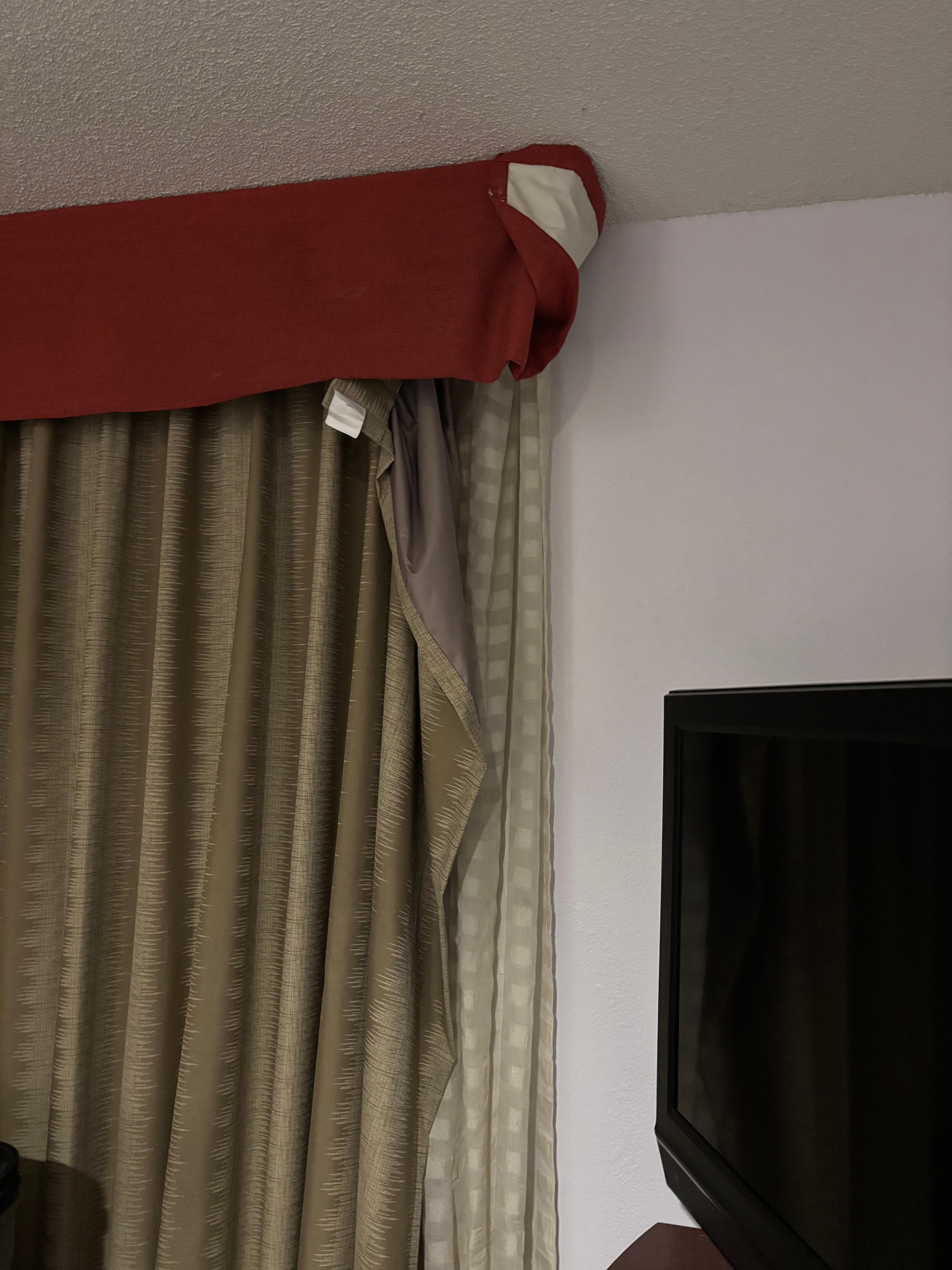 Curtain hanging off window