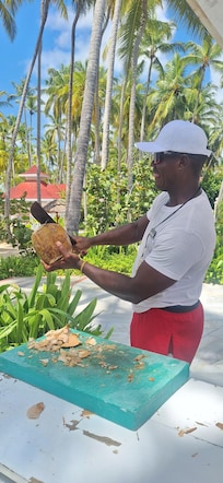 Fresh cut coconut for poolside cocktail