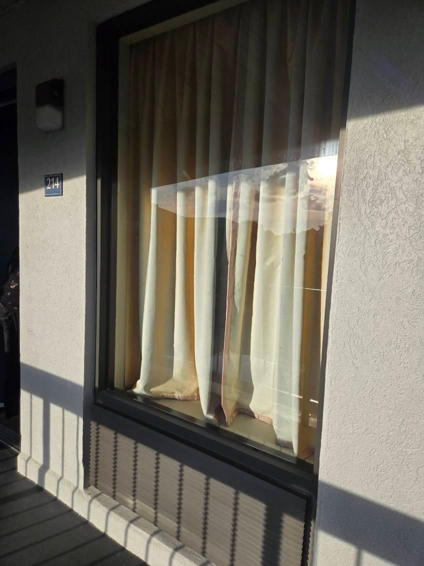 curtains were brown, dirty and old